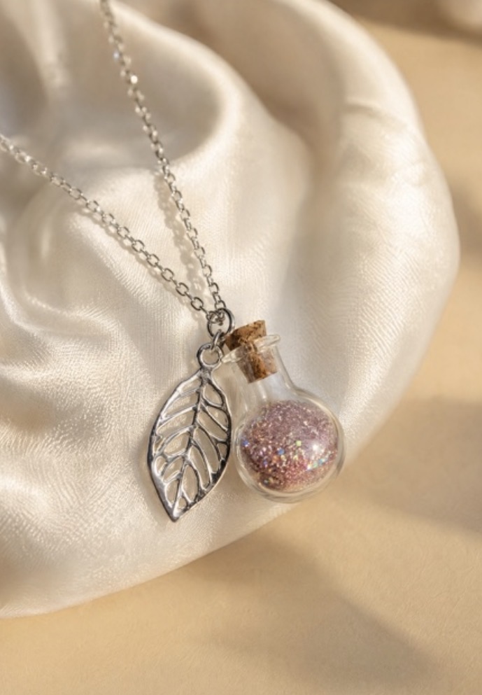 Silver leaf charm necklace with pink glitter bottle